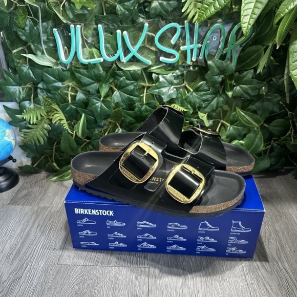 Birkenstock Glossy Black Sandals with Gold Accents